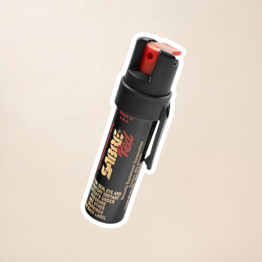 Widok frontowy gazu Sabre Red Stream – kompaktowa forma i klips mocujący do paska.